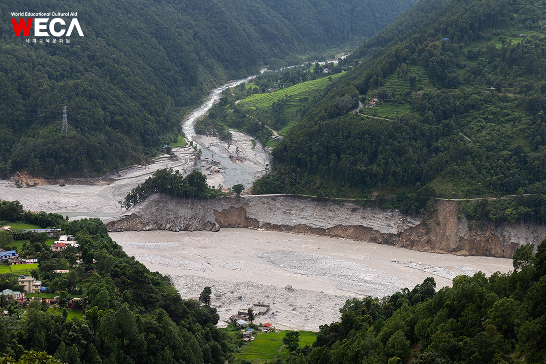 Houses and roads damaged by major floods A panoramic view of the flood-damaged sites in Nepal's Rasu and Uttagarye, which disappeared without a trace and were left in ruins