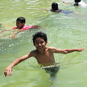 Fun swimming time for children at Withhome, Shan State, Myanmar