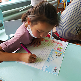 Supporting supplies and writing letters to sponsored children in Kyrgyzstan